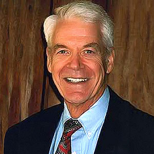 Dr. Caldwell Esselstyn smiling and posing